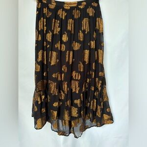 Florets black gauze skirt with copper flower detail.